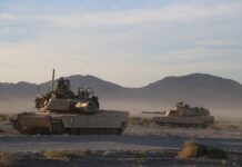 Ile pali Abrams na 100 km?